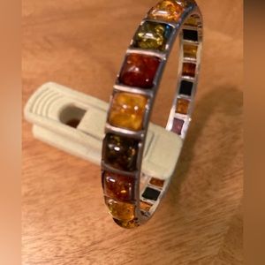 Multi color amber bangle bracelet set in silver.
